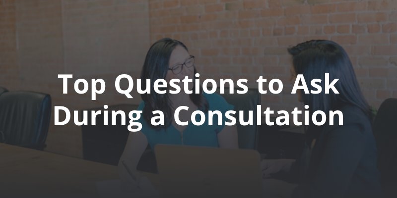 attorney and client consultation with caption: Top Questions to Ask During a Consultation